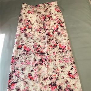Long floral skirt with a mini lining and slit